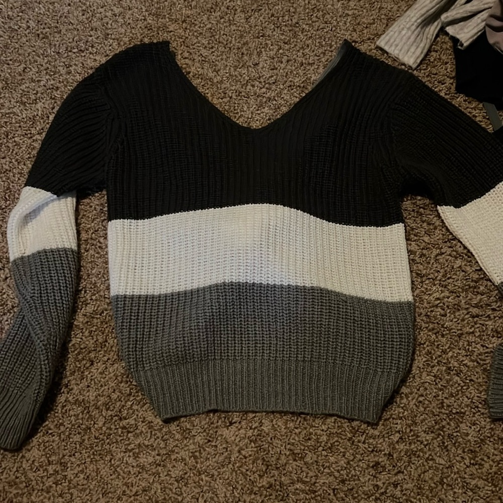 Black, white and gray sweater
